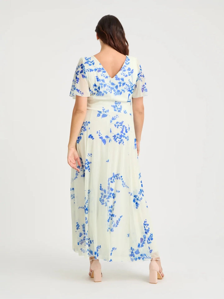 Scarlett &amp; Jo Isabelle Ivory Azure Blue floral maxi dress showing the V-shaped back neckline, sheer angel sleeves and flowing skirt.