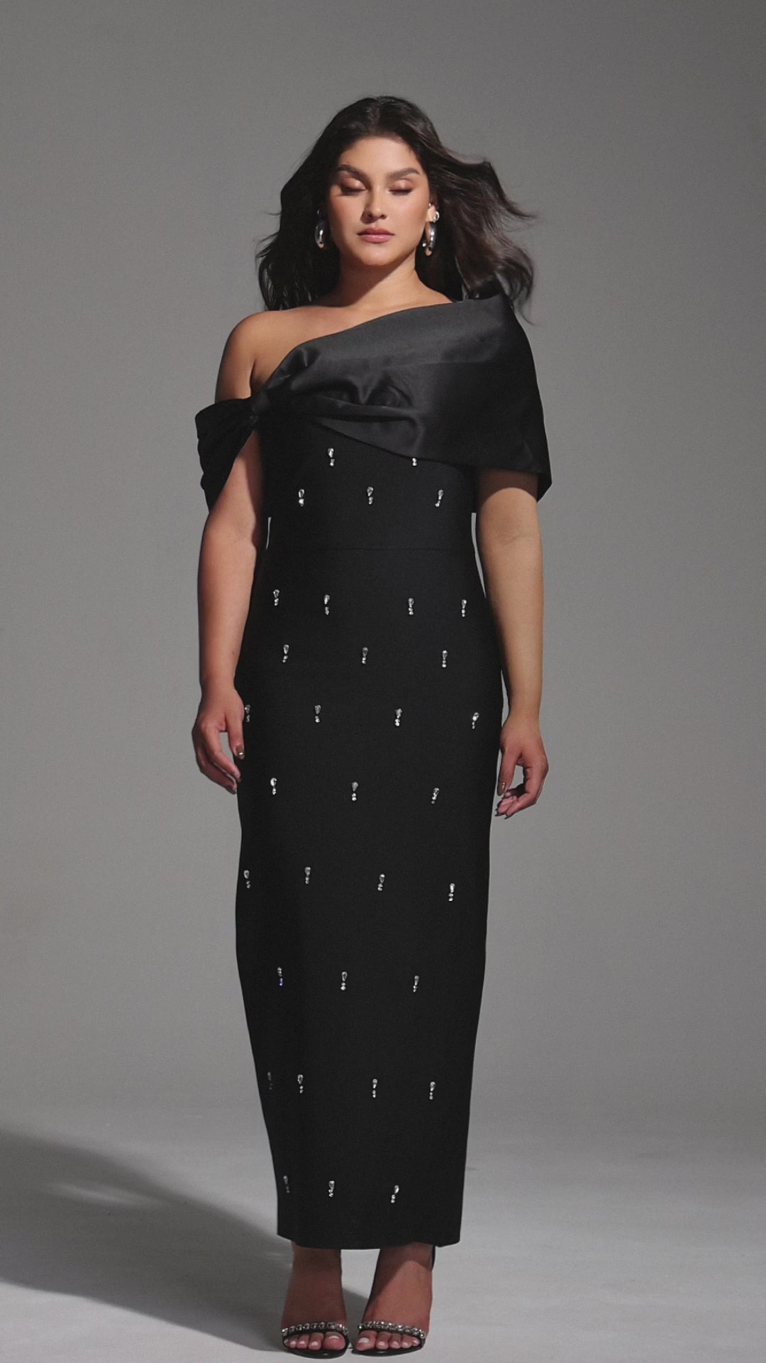 Black One Shoulder Evening Gown with Satin Fold Neckline and Embellished Detail